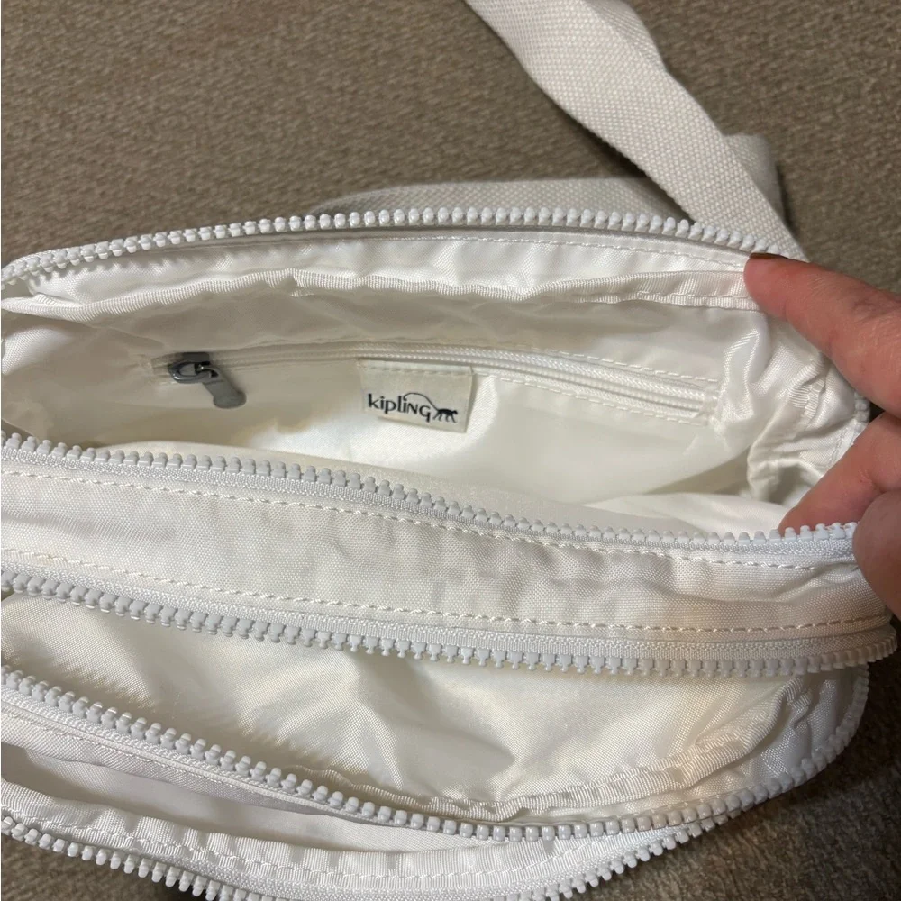 Kipling Small Crossbody Bag in White with Plush Monkey Charm